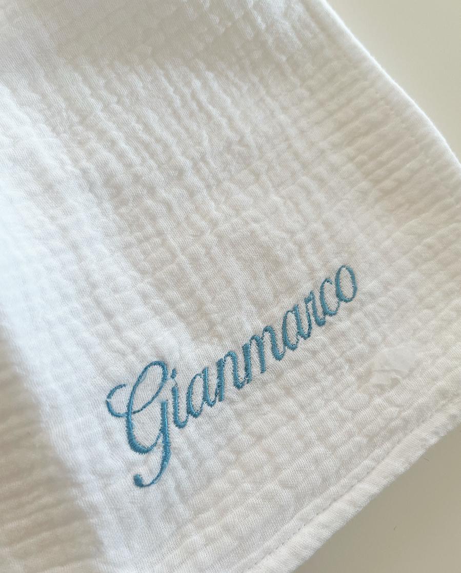 Mussola di cotone tinta unita con nome